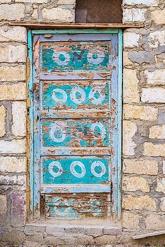 Faiyum-Egypt A blue painted door on a building Art Print